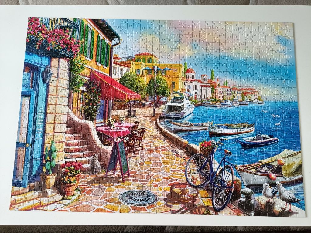 Puzzle 1000 Trefl kompletne "Słoneczny bulwar"