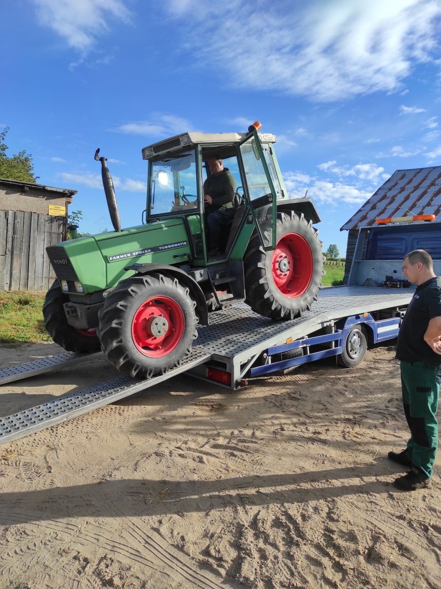 Pomoc Drogowa Holowanie Usługi Transport Autolaweta Laweta

OPIS