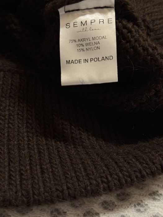 Жіночий вʼязаний прогулянковий костюм