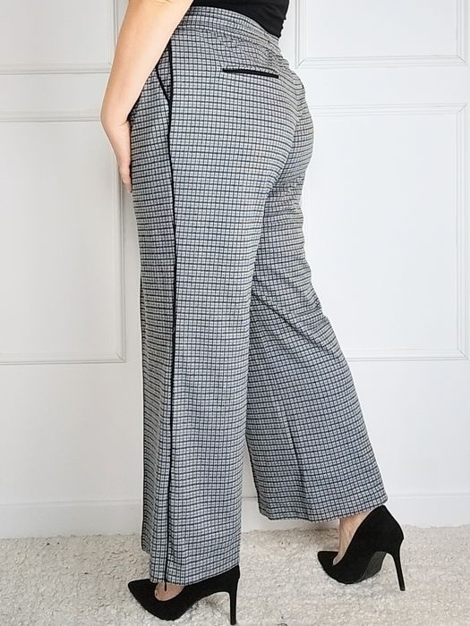 Szare spodnie z szerokimi nogawkami plus size 46