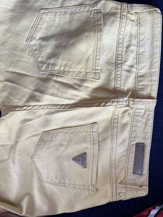 Spodnie jeansowe żółte r. 34 Guess