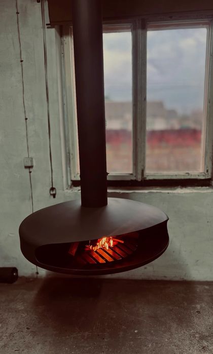 Підвісний камін з можливість обертання на 360°