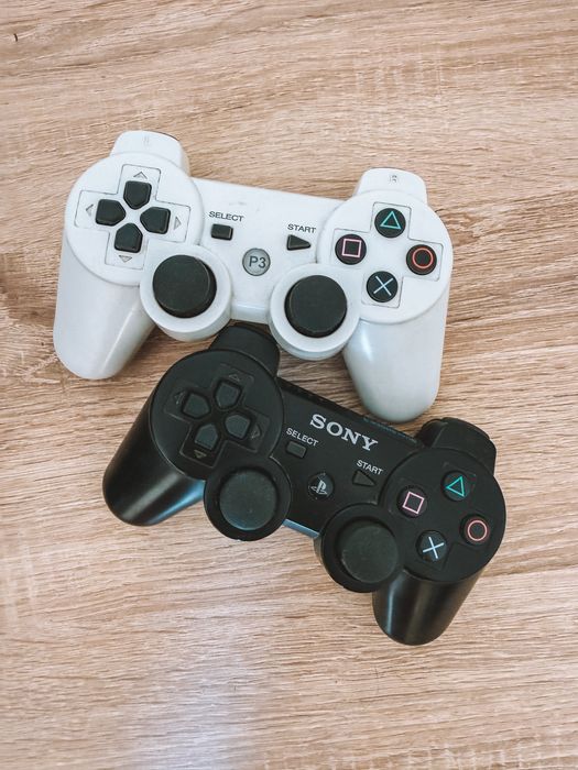 Playstation 3 Slim + 2 comandos + Jogos