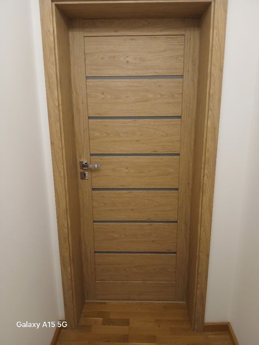 Drzwi wewnętrzne  panele podłogowe montaż