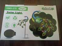 Ogrodowa lampa solarna paw