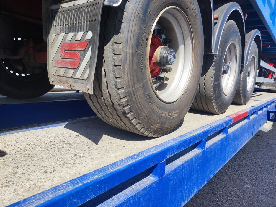 Самоскид контейнеровоз зерновоз заводський полуприцеп 68 кубів