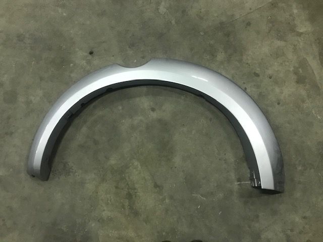 Aba tras esquerda Mitsubishi Strakar l200