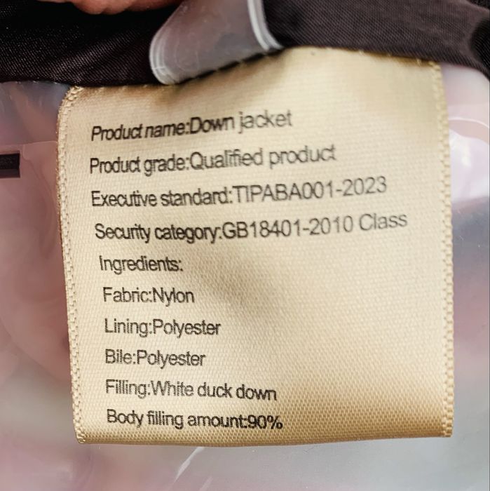 Пухова куртка з натуральним хутром