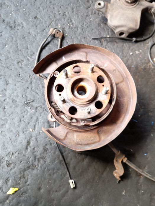 Поворотный кулак, цапфа, ступиця, супорт, диск, Туксон, КІА, KIA