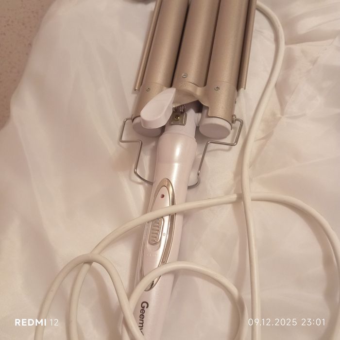 Тройна плойка до волосся