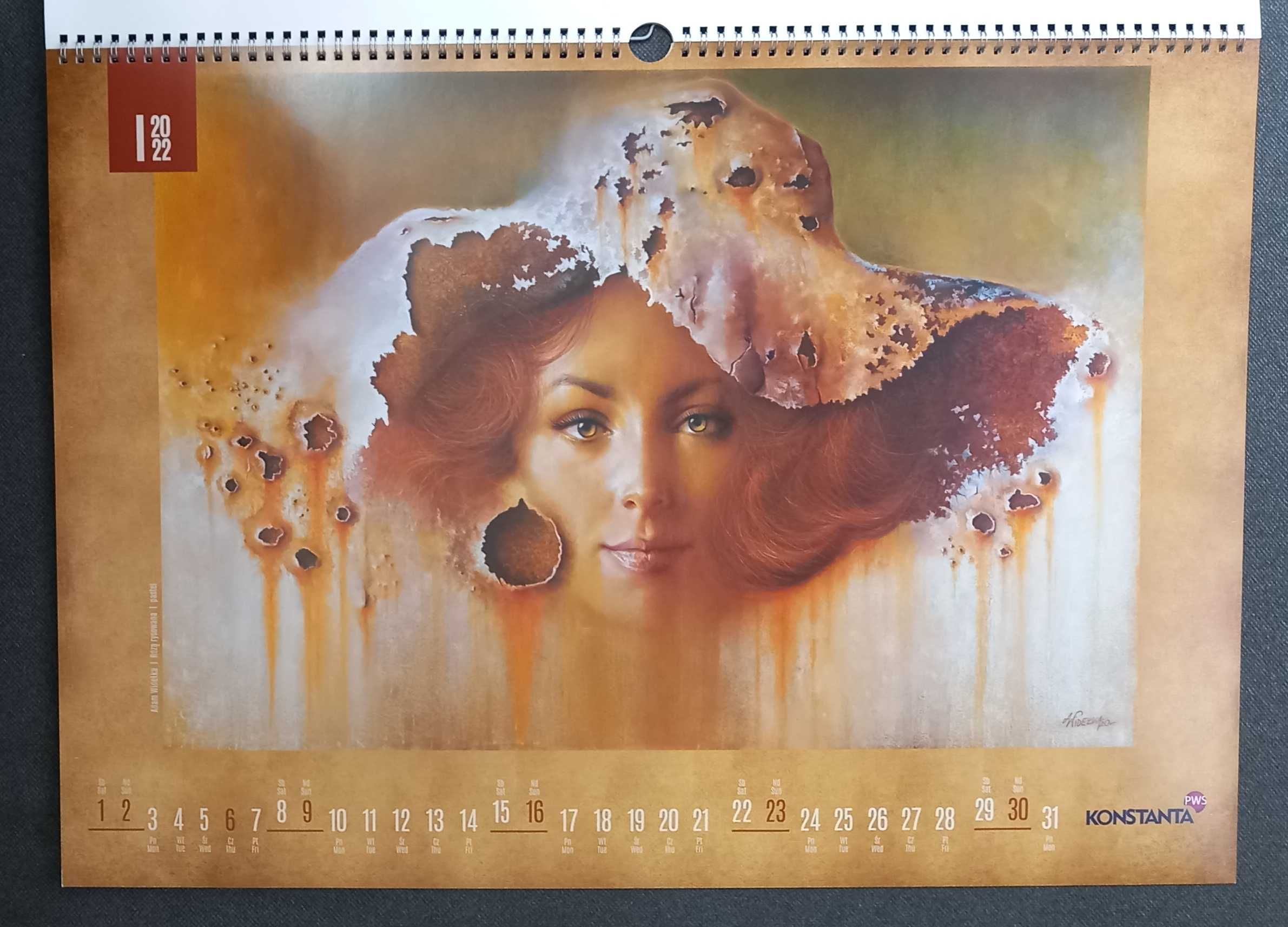 Duży kalendarz ścienny 59x42 cm. Portrety Adama Widełki
