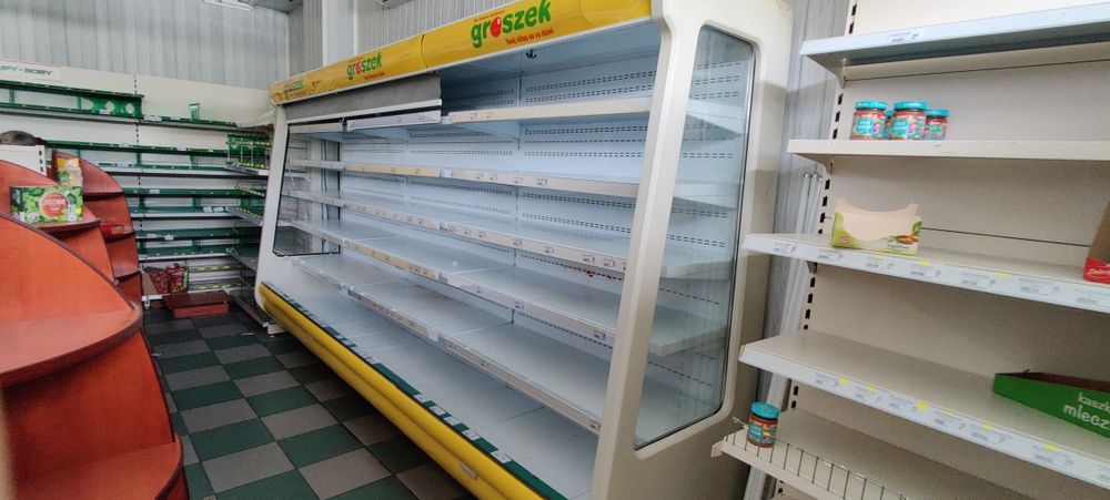 Wyposażenie sklepu lady chłodnicze regały krajalnice waga klimatyzacja