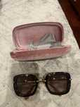 O ulos de sol Miu Miu