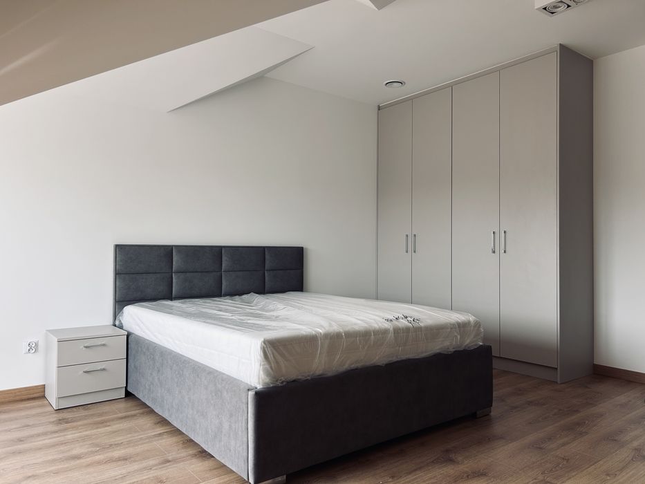 Łóżka tapicerowane na wymiar – solidne, eleganckie, nowoczesne