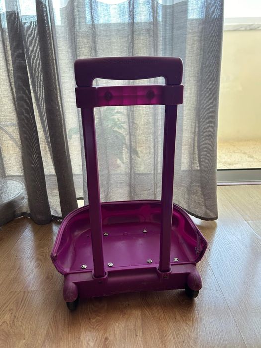 Mochila, base com rodas e estojo