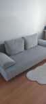 Sofa rozkładana, szara z Agata meble.