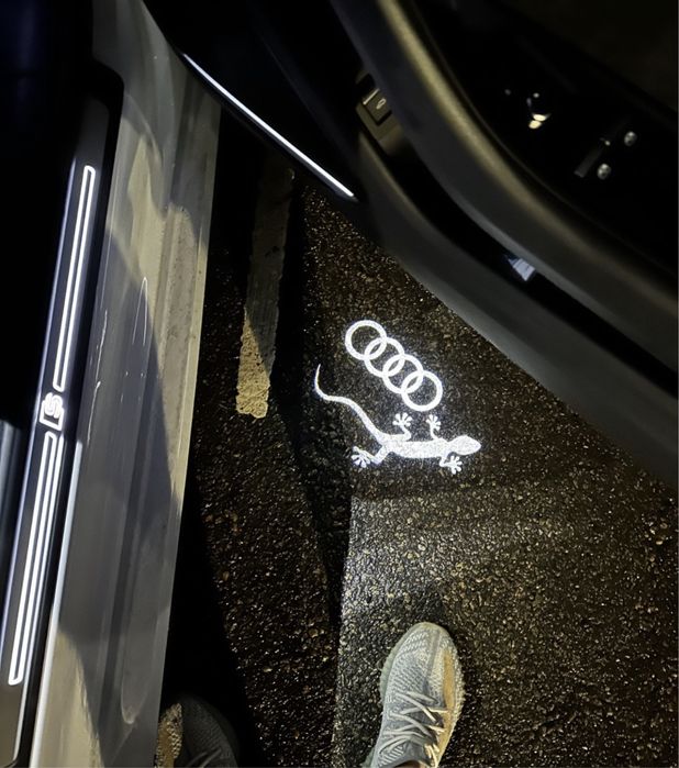 Audi проектори OSRAM логотип гекон