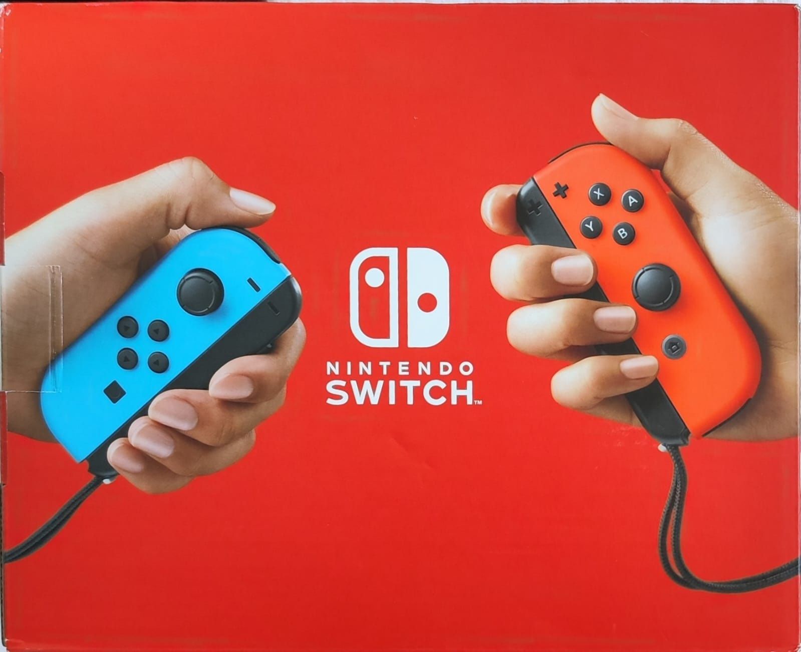 Nintendo Switch with Neon Blue and Neon Red Joy-Con (