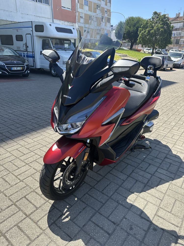 Encosto Honda forza