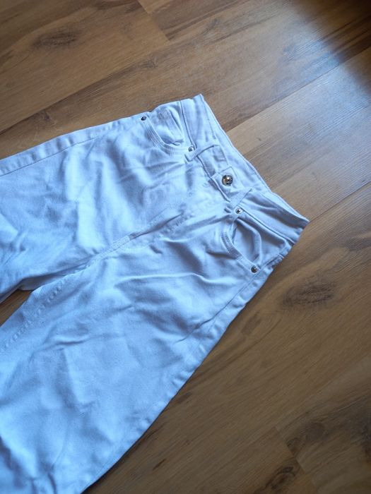 Biale jeansy H&M 32