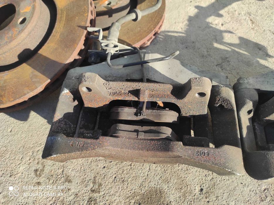 Audi A6 C6 a4 zaciski 974 973 jarzma 716 tarcze oryginał gwarancja 320