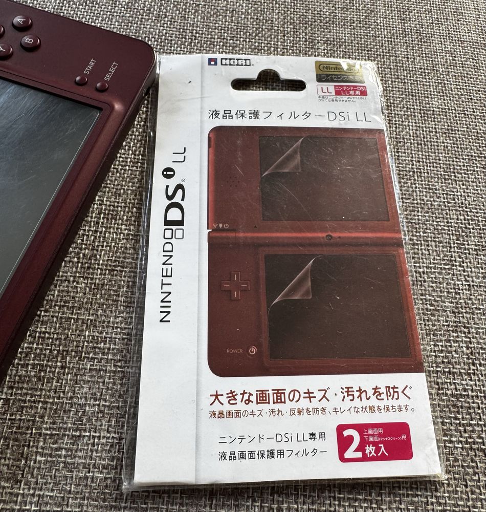 Nintendo DSI XL z polskiej dystrybucji full zestaw.