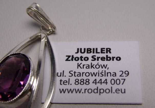 Przedwojenna srebrna zawieszka fioletowy kamień.