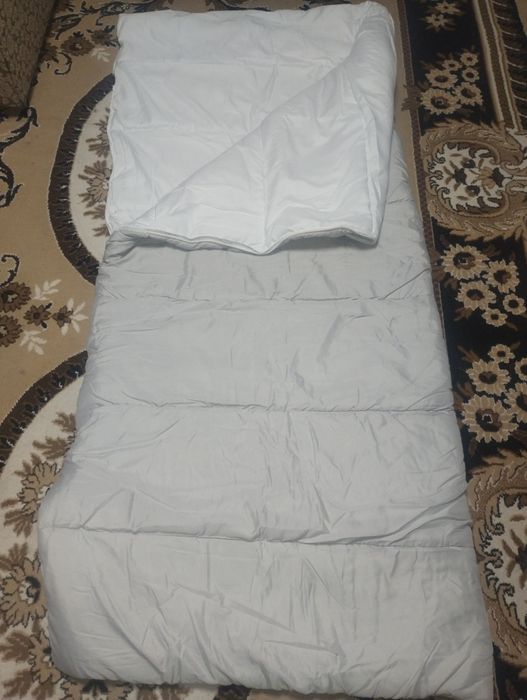 Спальні мішки для ліжка і подушки