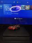 PS4 Slim + 2 pady + Gry + Stojak na gry