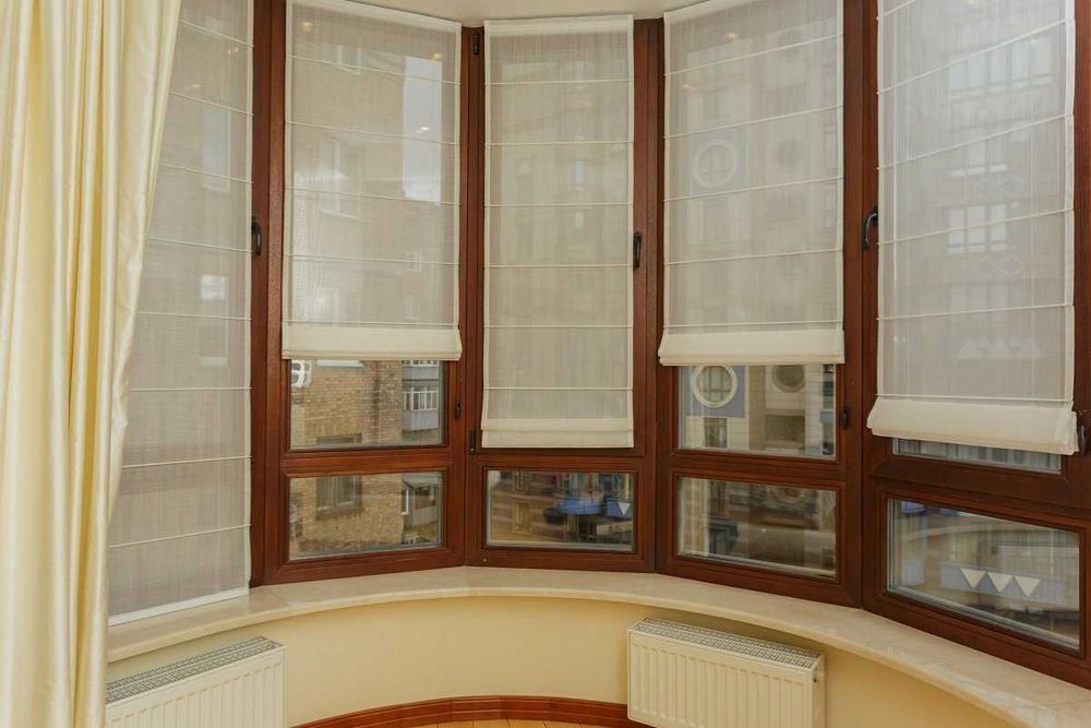 Вишукані штори та стильні жалюзі – інтер'єр, що зачаровує