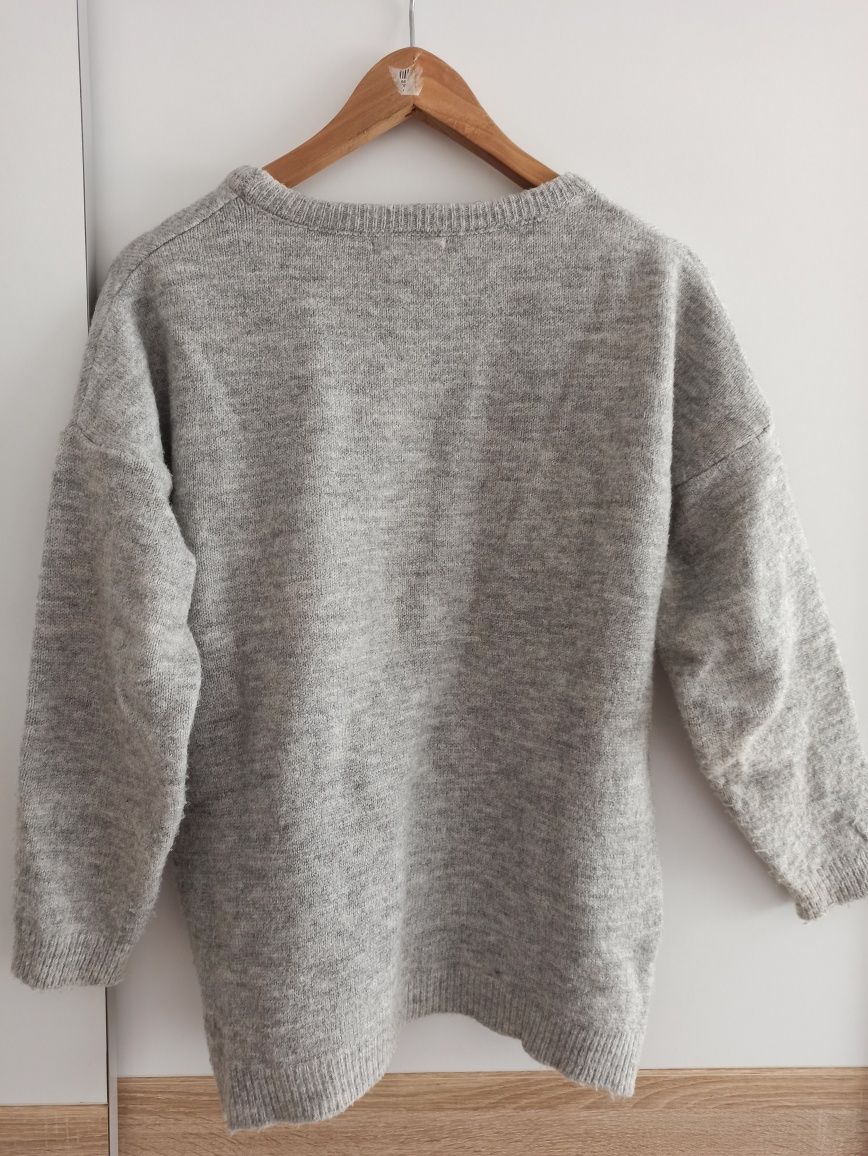 Sweter Megi z ozdobną kieszonką