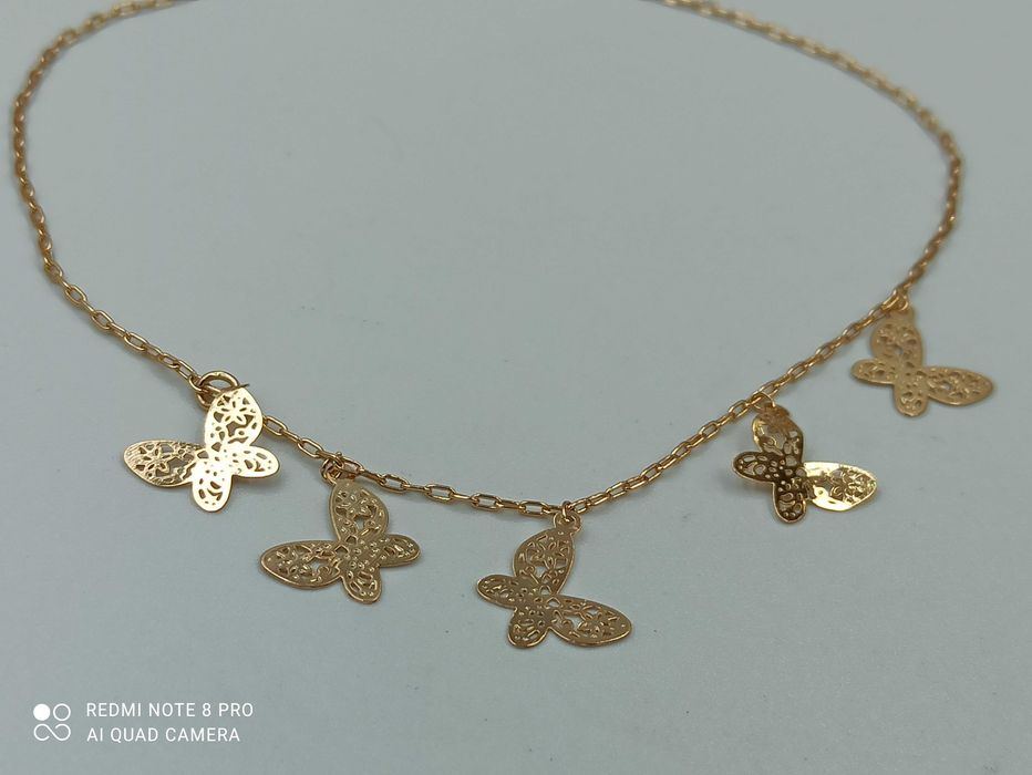 Bransoletka pozłacana 18k złotem na kostkę motylki