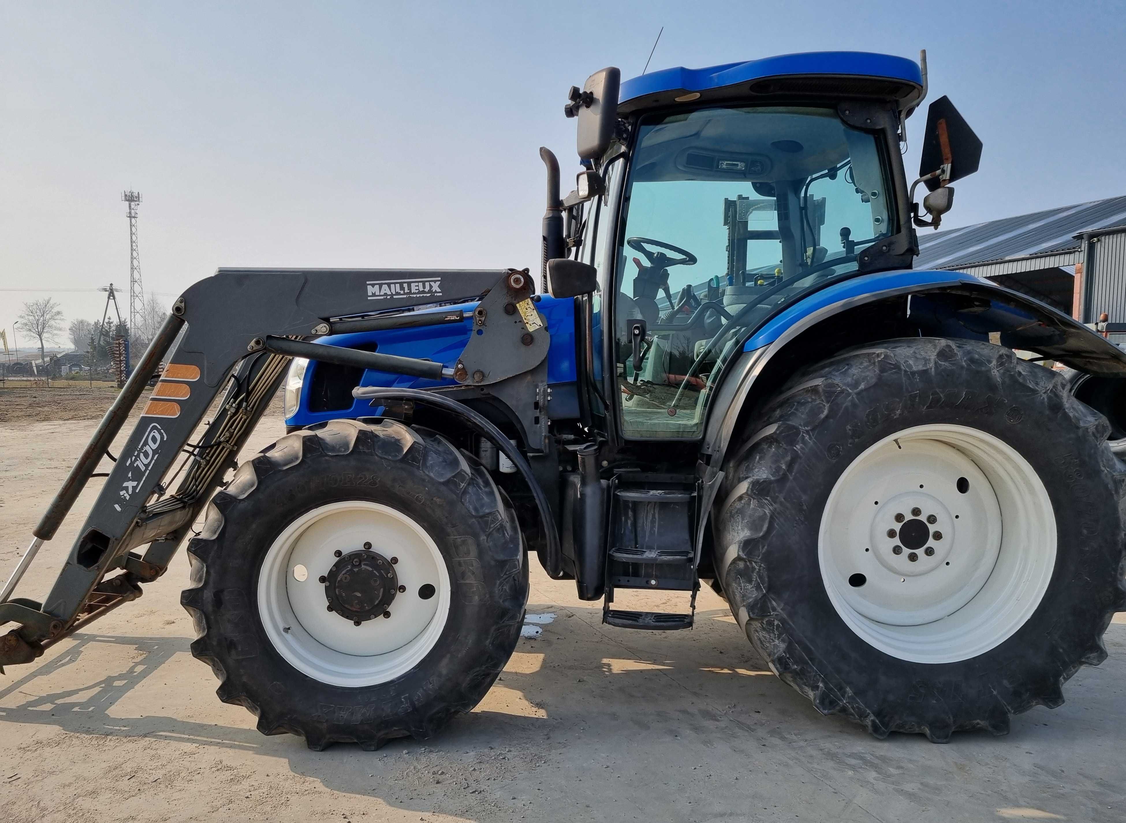 Ciągnik New Holland TS 110 z ładowaczem czołowym