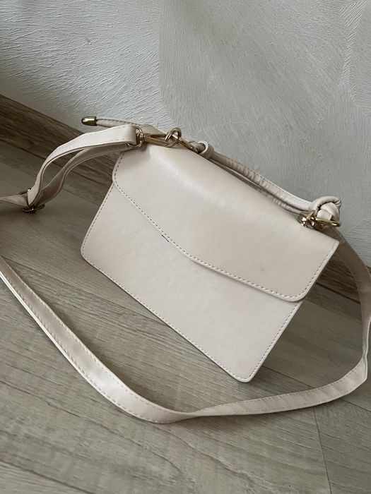 Сумка клатч бежевого кольору