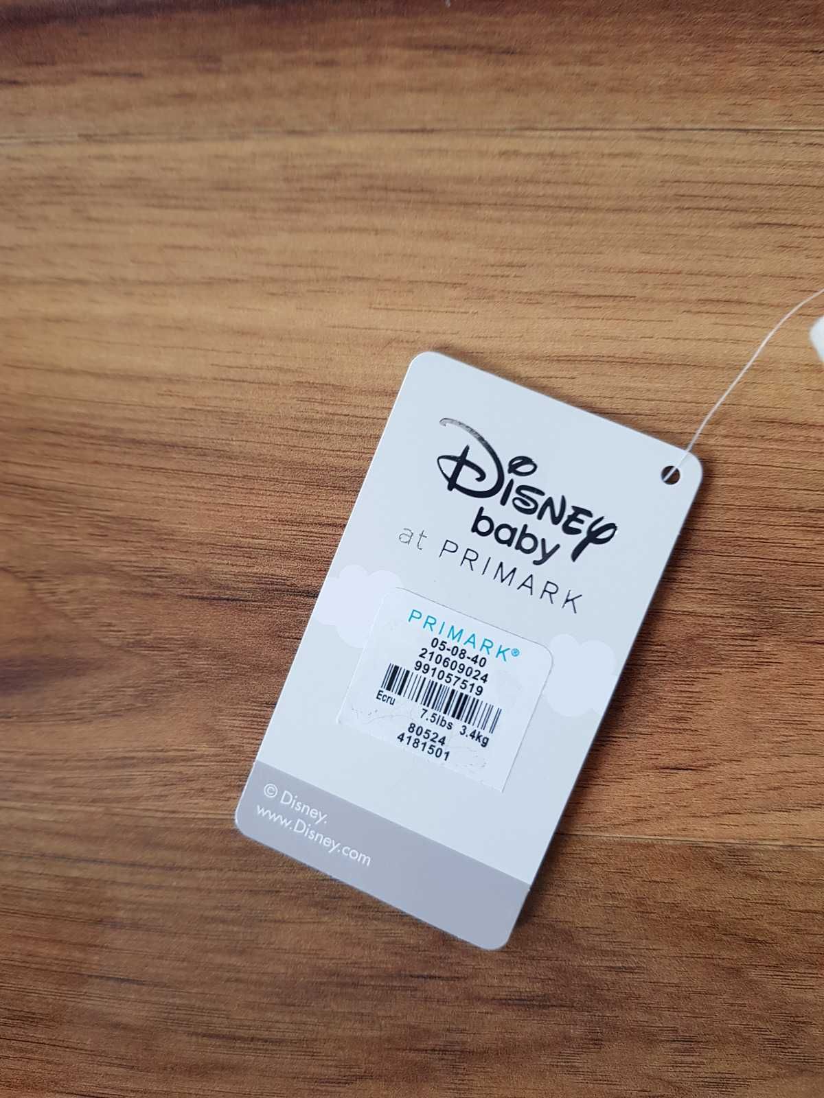 Beżowa  bluzka Kaczka Daisy kurtka Disney Baby  3,4 kilo 50 cm bluza