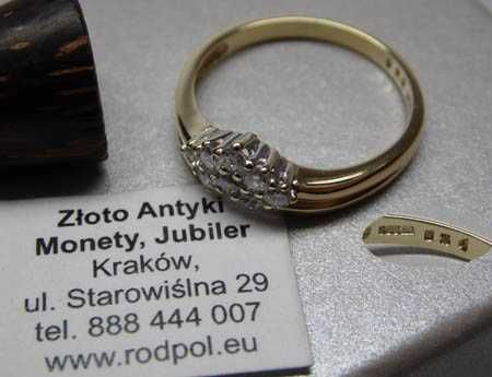 Złoty pierścionek z diamentami brylanty 0,31 ct.