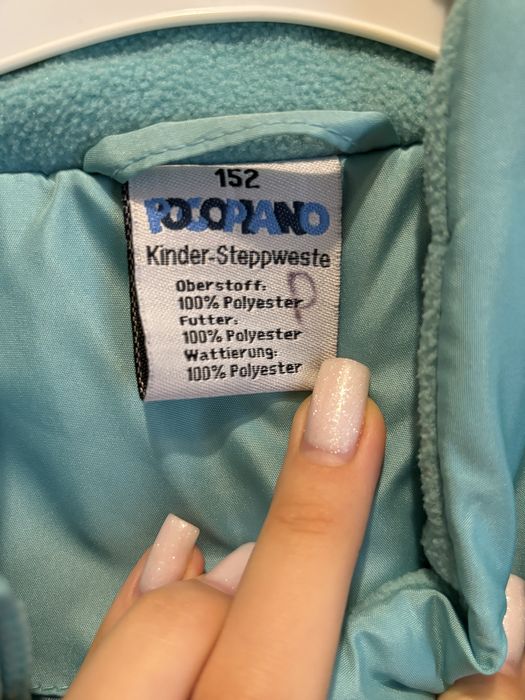 Жилетка блакитного кольору