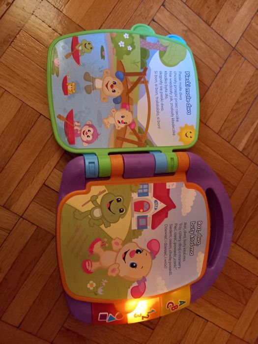 Grająca książeczka i laptop