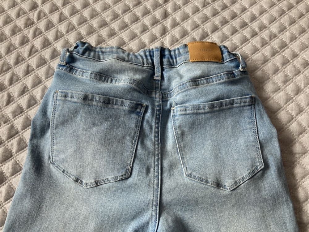 Dziewczęce jeansy spodnie rurki H&M w rozmiarze 146/152