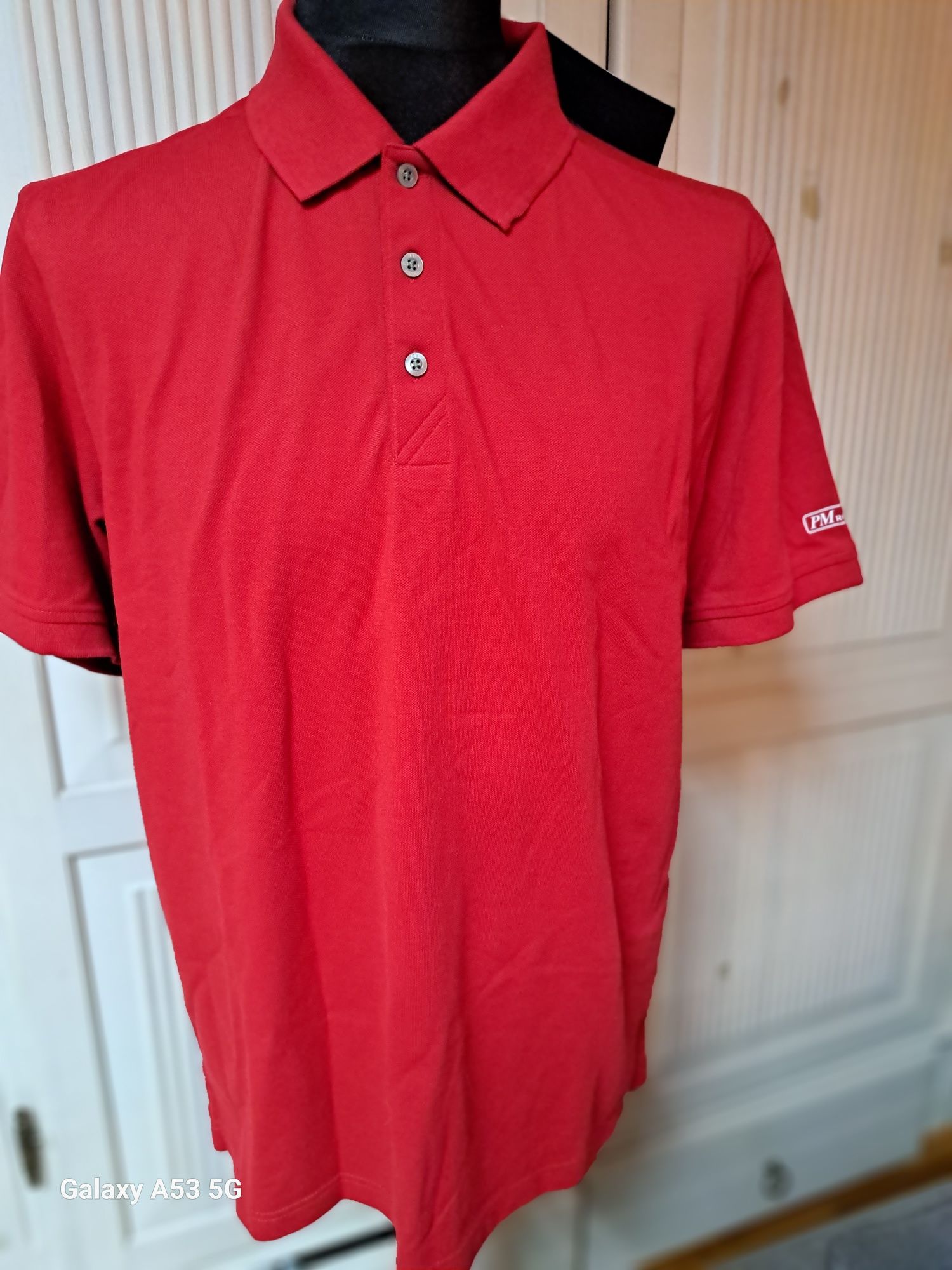 Elegancka bluzka męska polo.