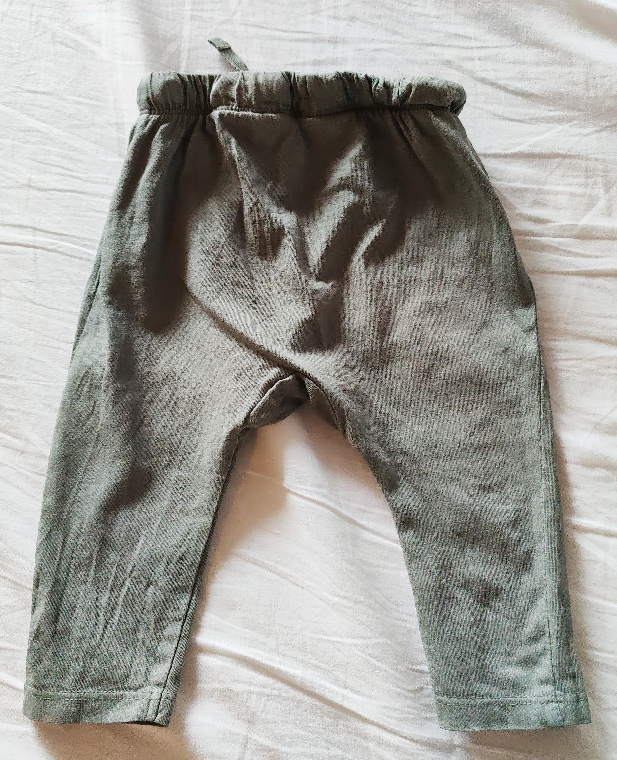 Jasnozielone spodnie niemowlęce H&M r 74 haremki