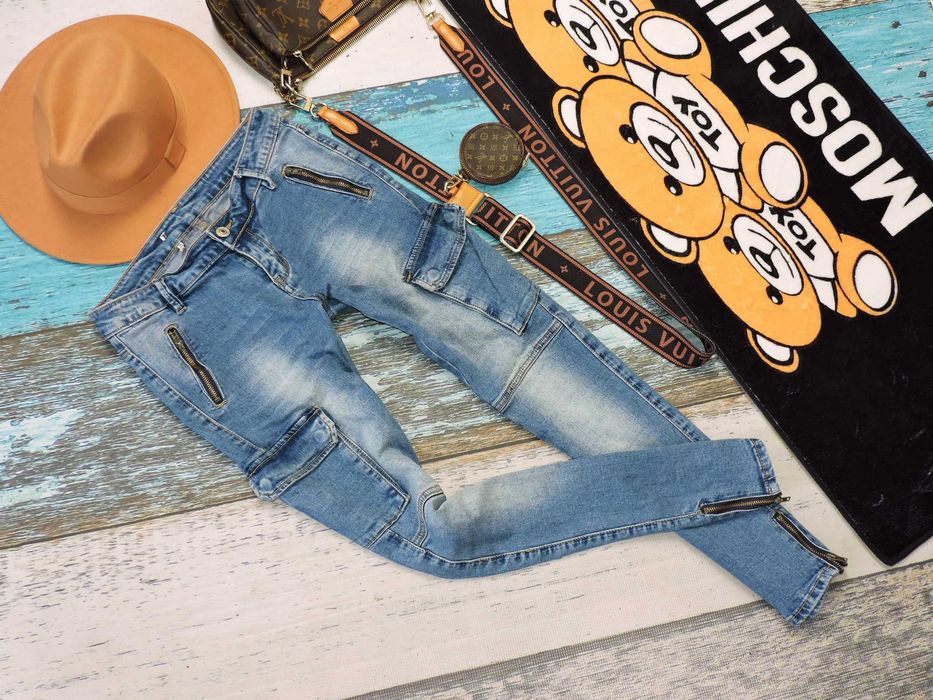 Daisy Spodnie jeansy rurki boczne kieszonki 38
