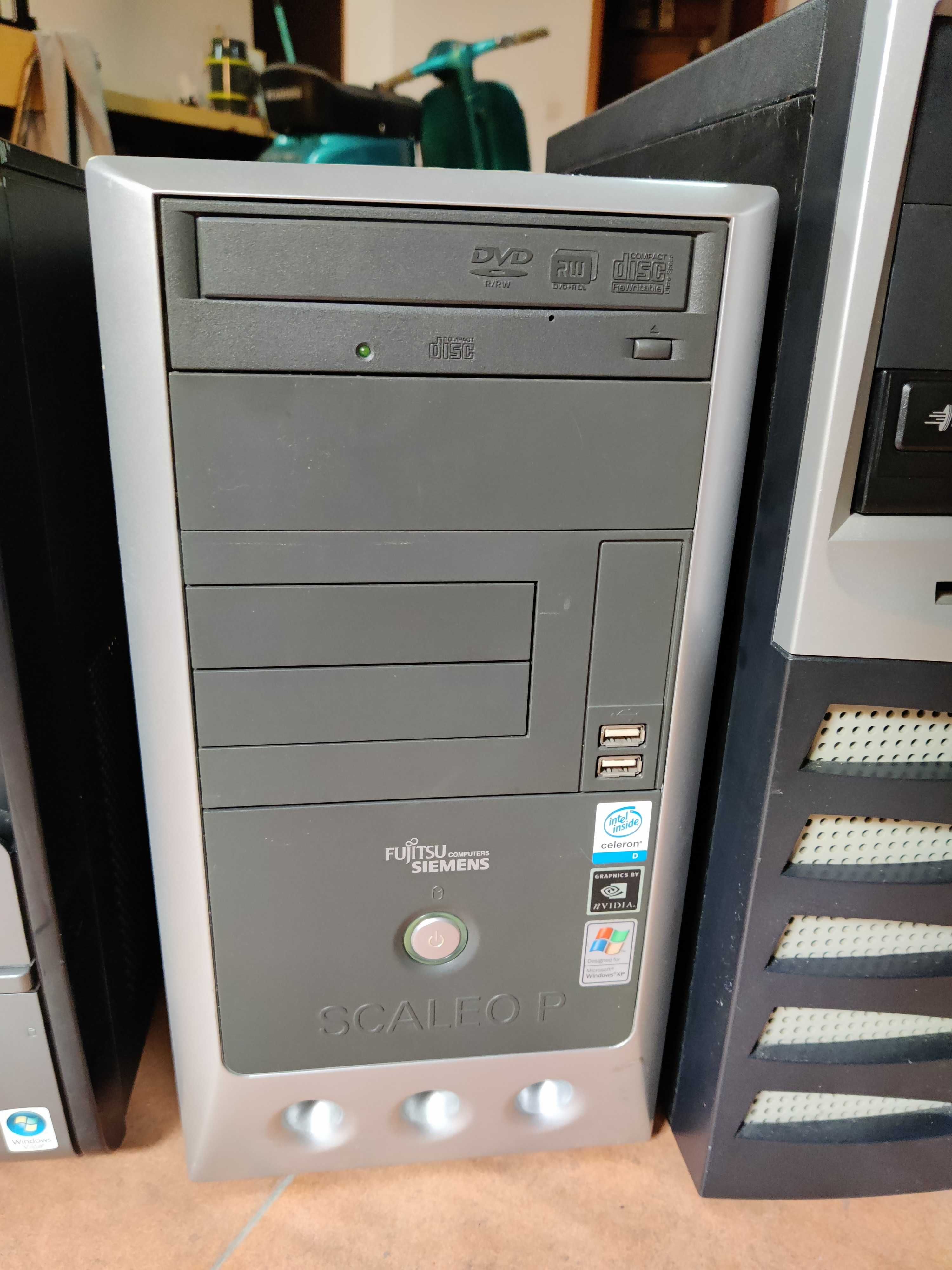 Conjunto 3 computadores a funcionar.