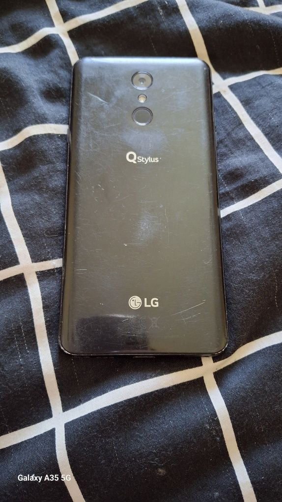 Телефон LG Qstylus