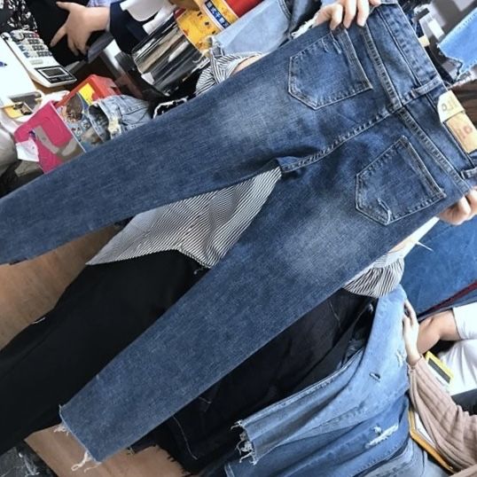 Рвані нові джинси