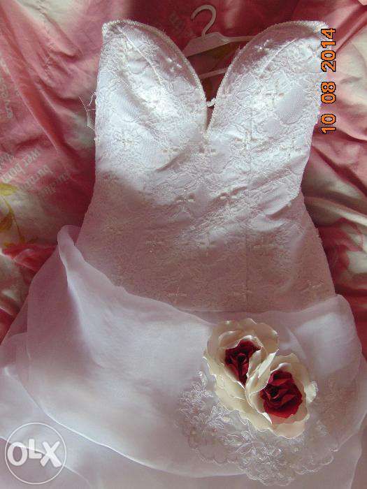 super nowiutka suknia ślubna