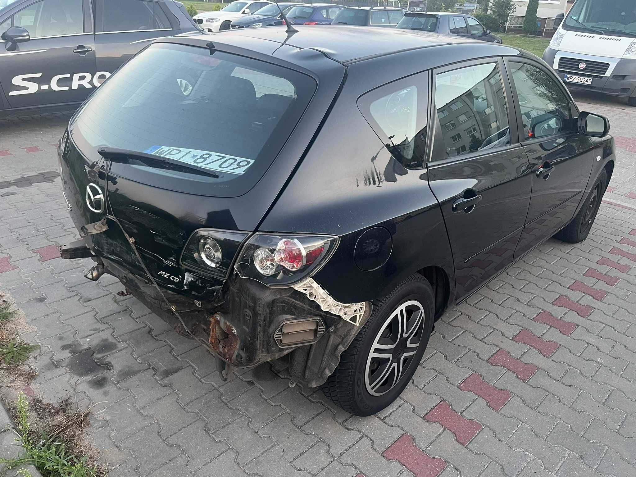 Mazda 3 uderzona w zderzak 2007 rok