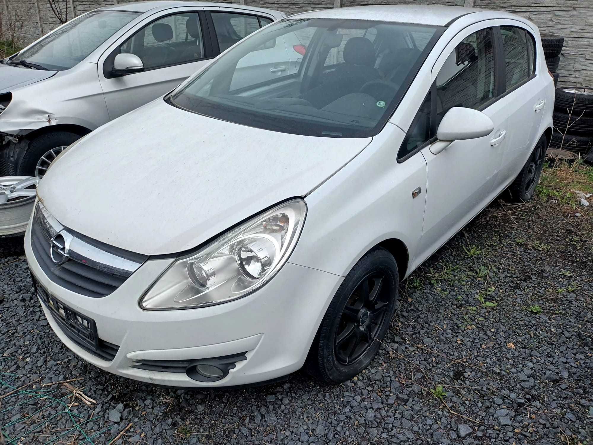 Opel Corsa D zderzak maska błotnik drzwi klapa z474