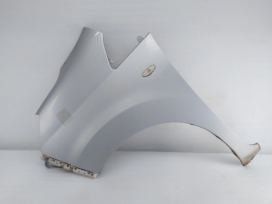 Guarda-lamas esquerdo NISSAN NV200 Furgão/Combi (M20)