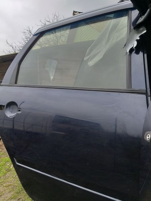 Двері передні і задні, кришка багажника  Лада  Калина 1118 седан